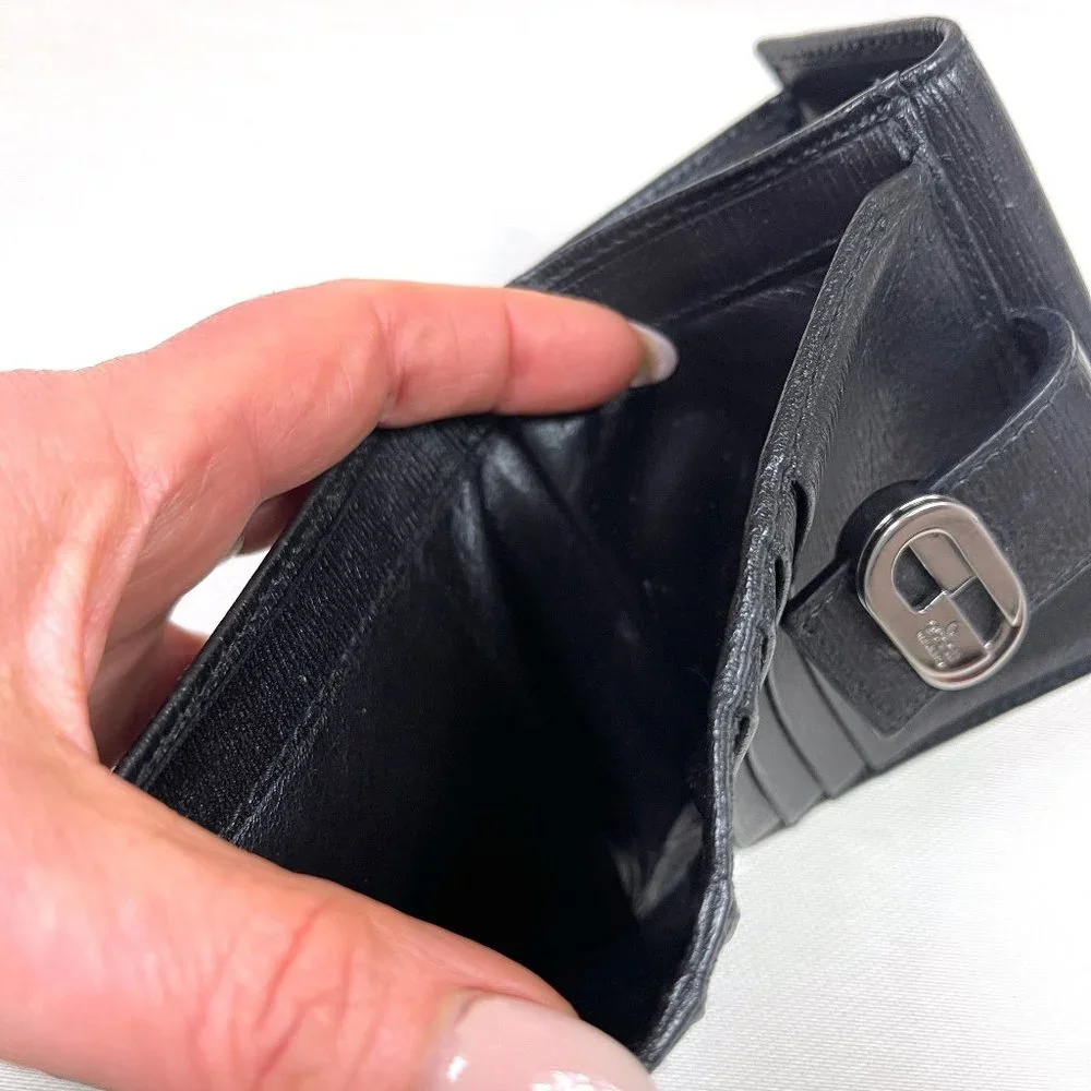Auc Gucci Snappy Bi-fold GG vintage leather wallet